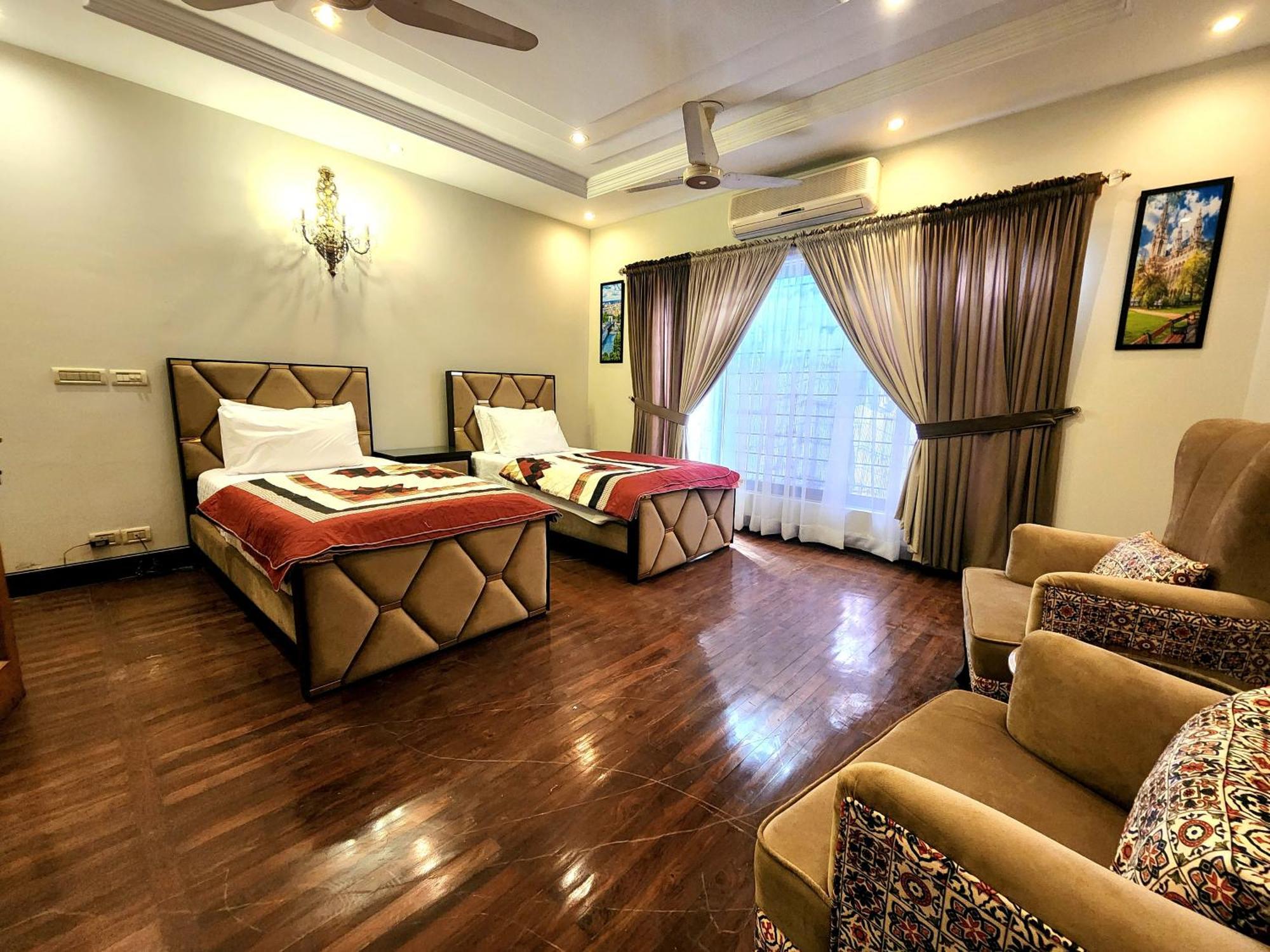 The Millenial Apartments & Suites Bahria Town Равалпинди Стая снимка