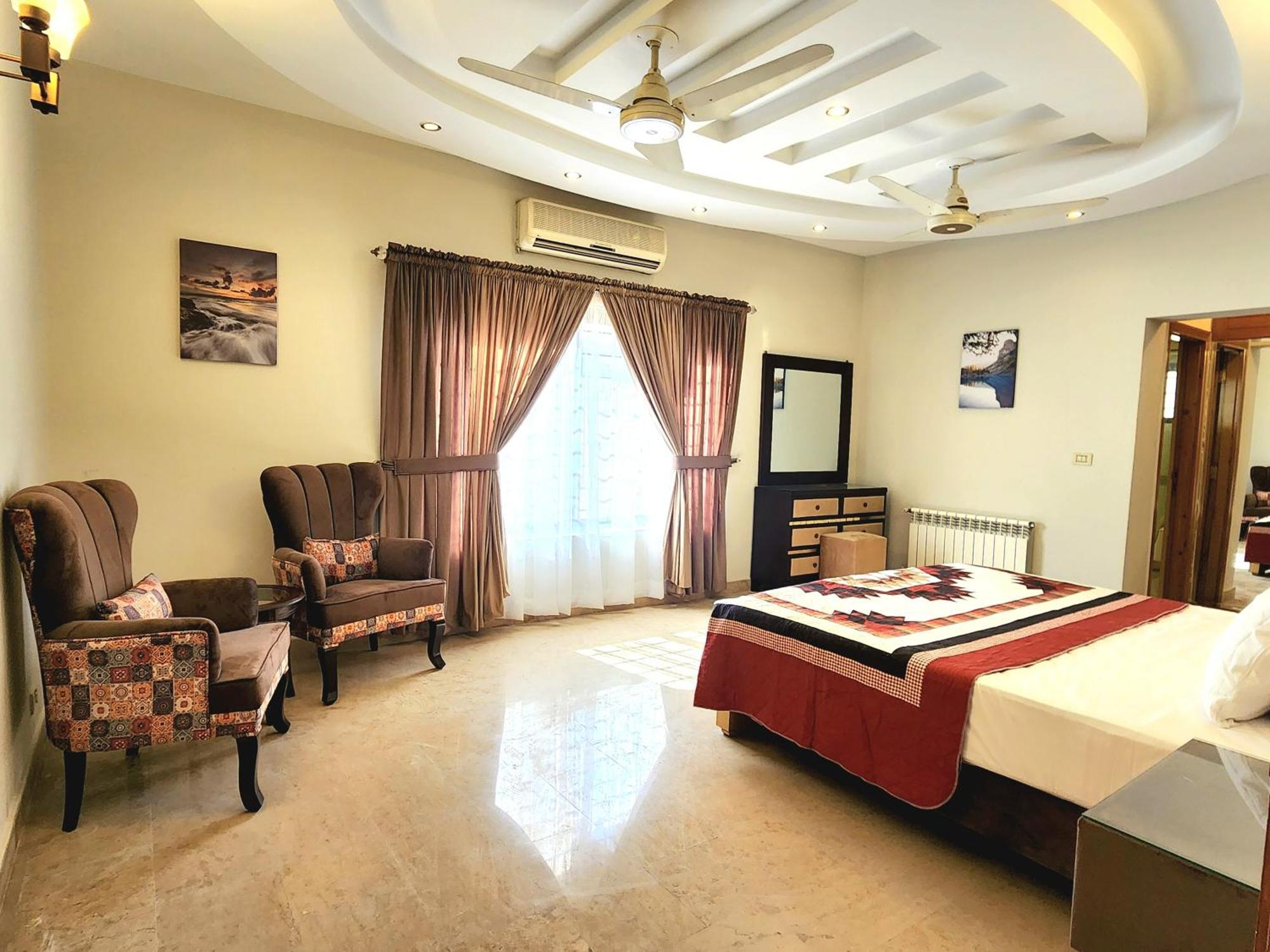 The Millenial Apartments & Suites Bahria Town Равалпинди Стая снимка