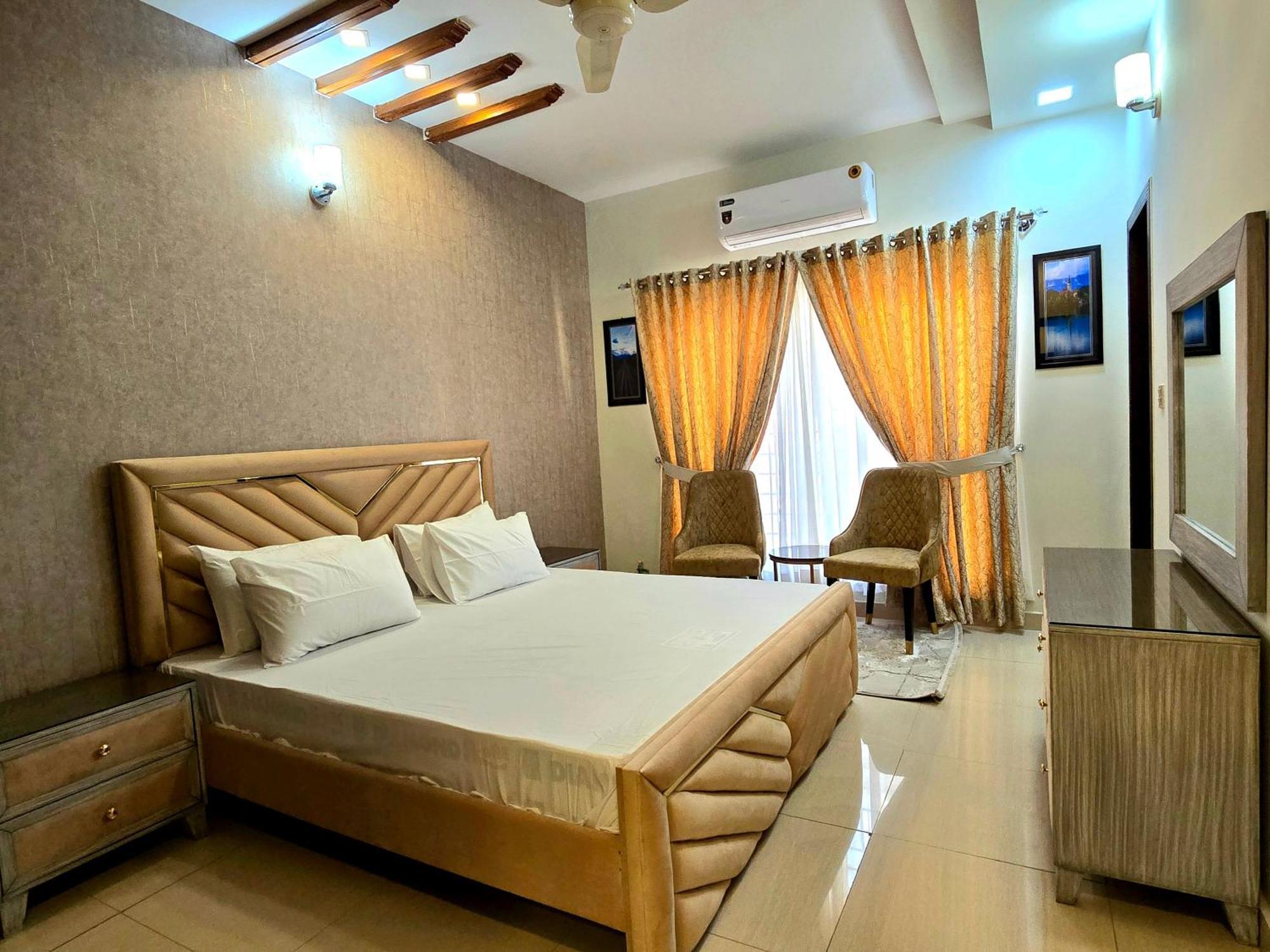 The Millenial Apartments & Suites Bahria Town Равалпинди Стая снимка